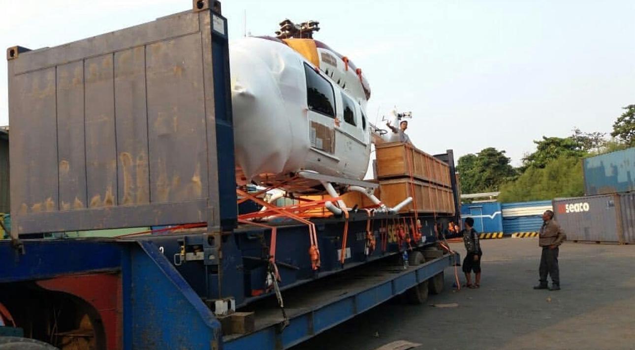Freight containers being loaded for the Singapore route